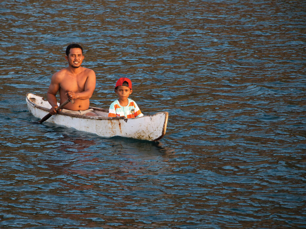 Father and son canoeing