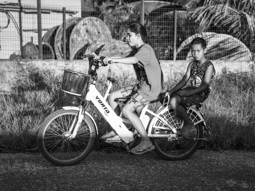 Person riding on the back of a bike