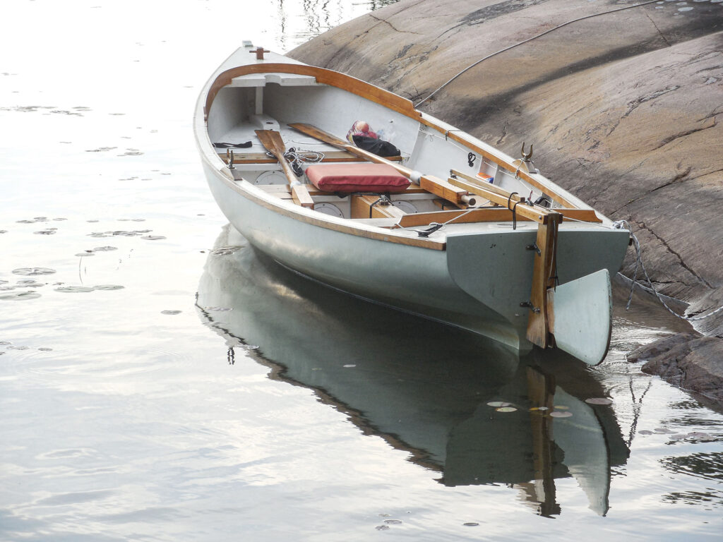 keelboat next to shore