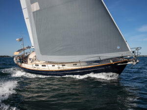 Yacht Althea underway in Mackerel Cove and off Castle Hill, Newport, RI.