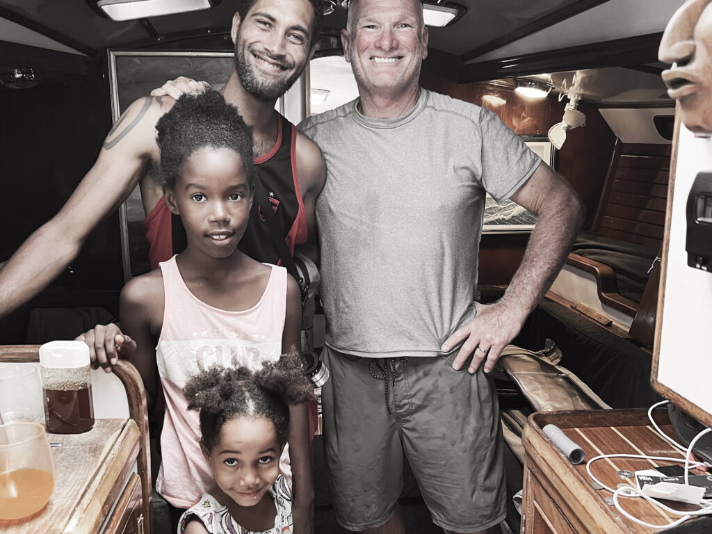 The author and friends aboard his boat