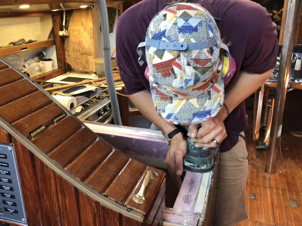 Chris sanding the insulation