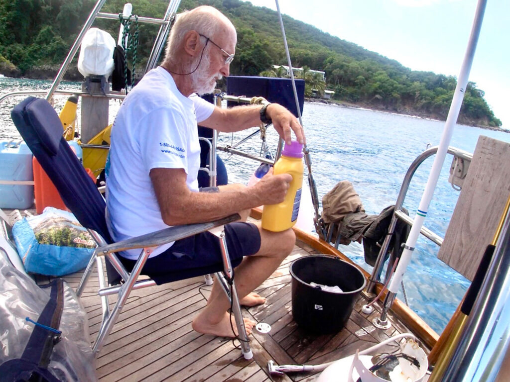 washing clothes on the deck of a sailboat