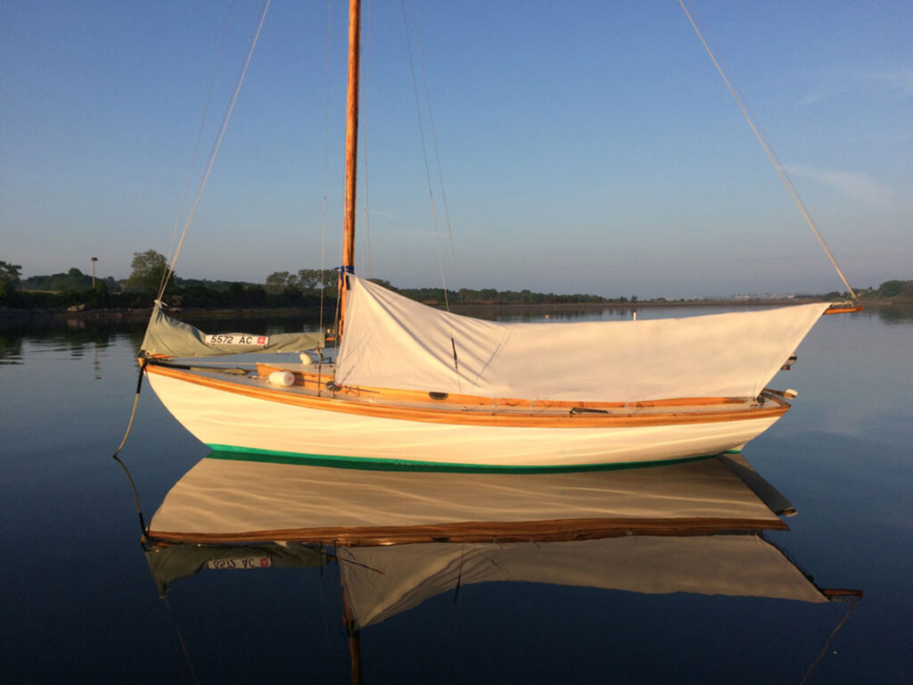 Sailboat on the water at sunrise