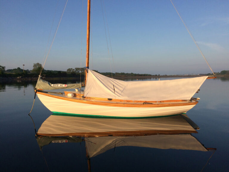 Sailboat on the water at sunrise