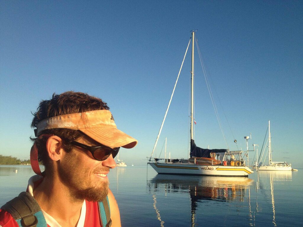 Rob with sailboat in background