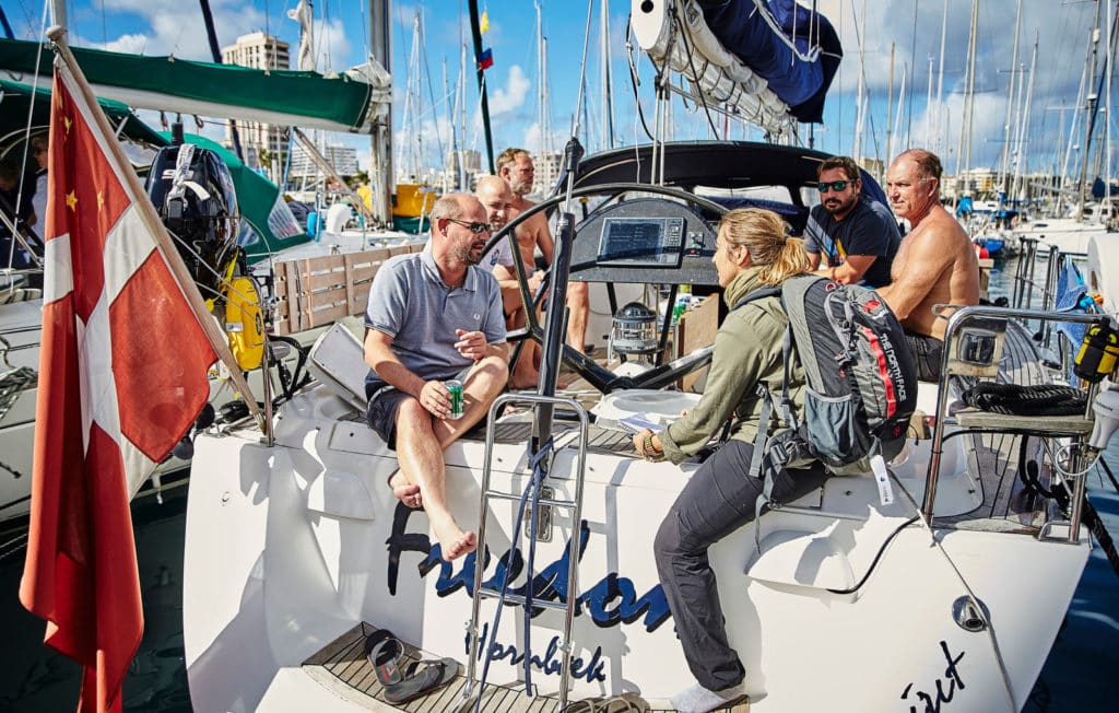 People sitting and talking on a boat