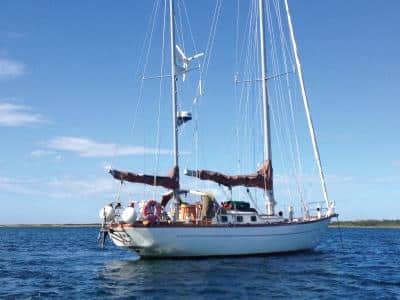 _Lyra_, a classic Reliance 44, rests at anchor off Block Island.