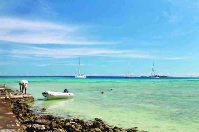 Although picturesque, the anchorage at Suwarrow Atoll is safe only in settled weather. You can tie up the dinghy at the old stone wharf on Anchorage Island.