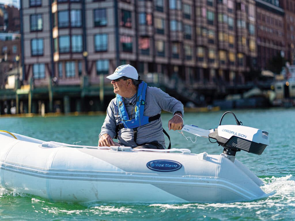 Mark Pillsbury testing an outboard motor.