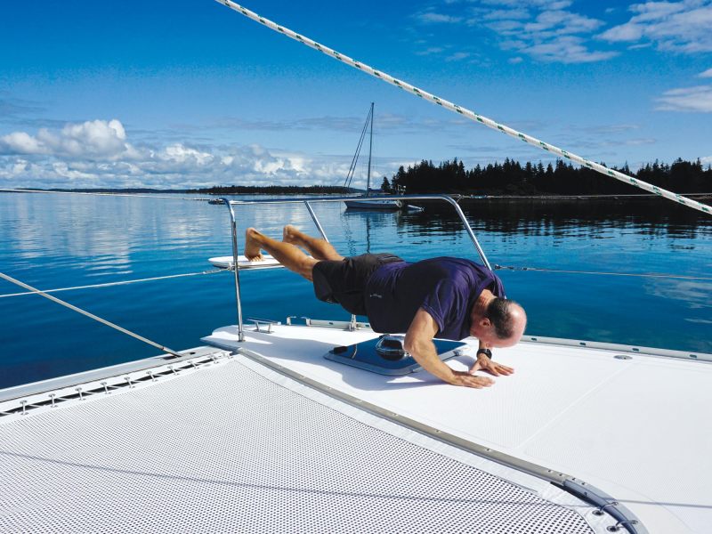Underway-Fitness-1 Man exercising on a sailboat