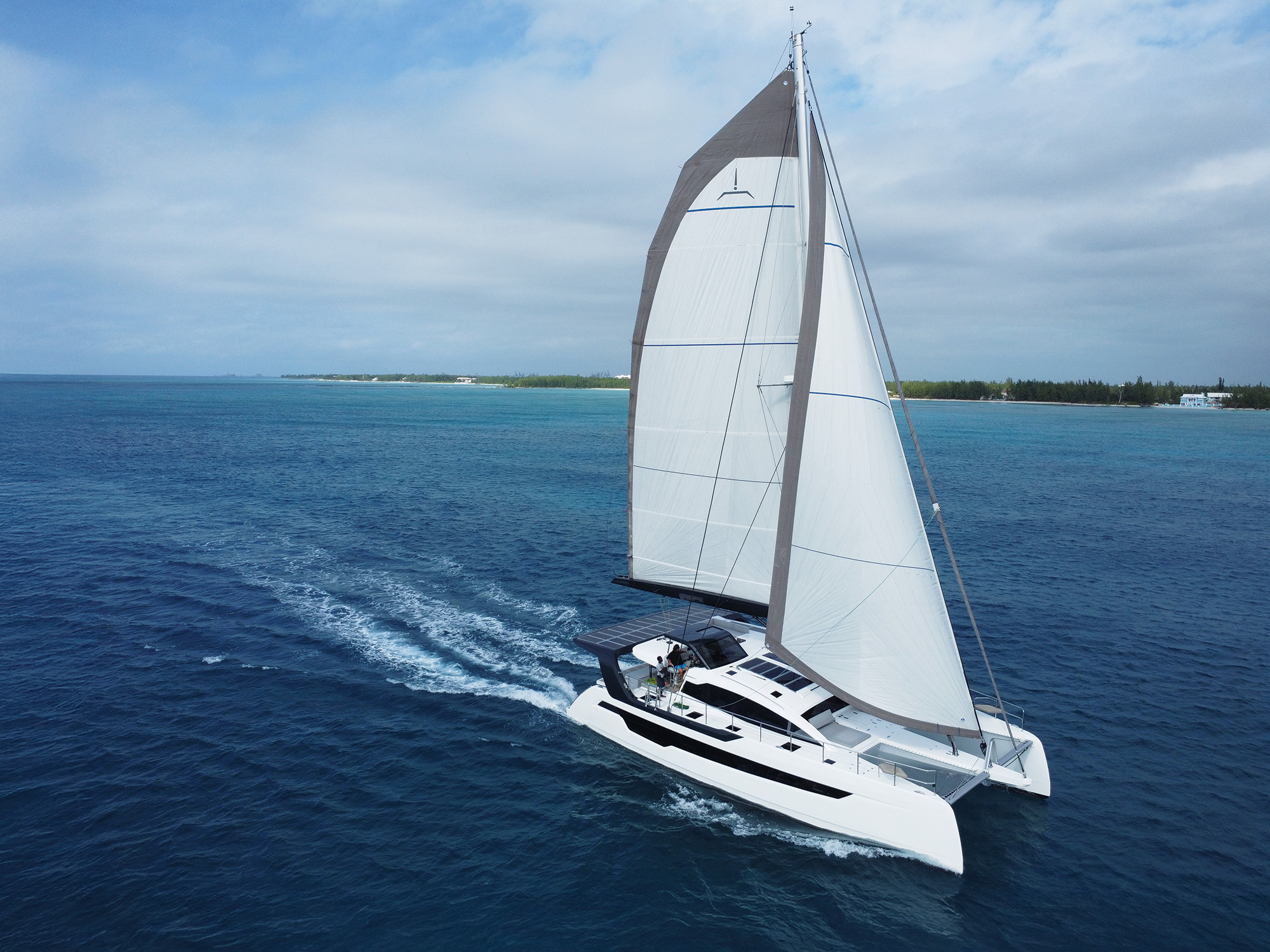 Xquisite 60 Solar Sail on the water