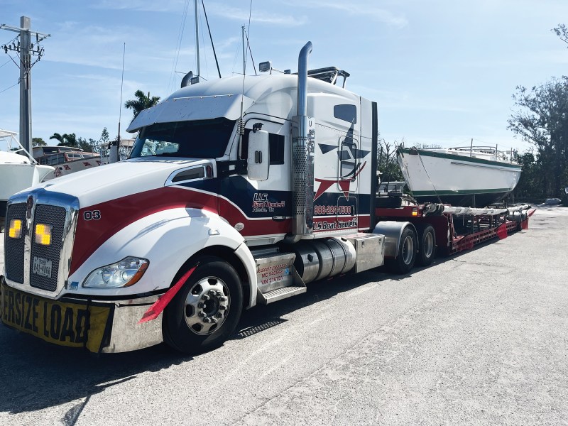 Herb-McCormick Pearson 365 being towed