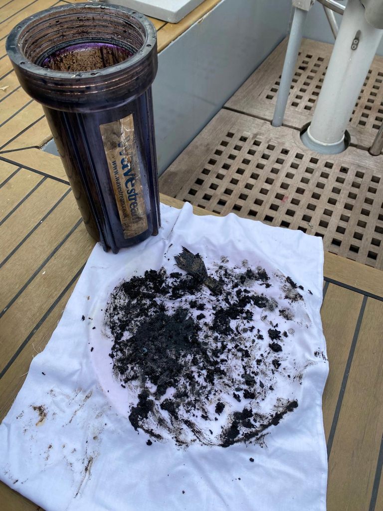 Oily waste captured in filter